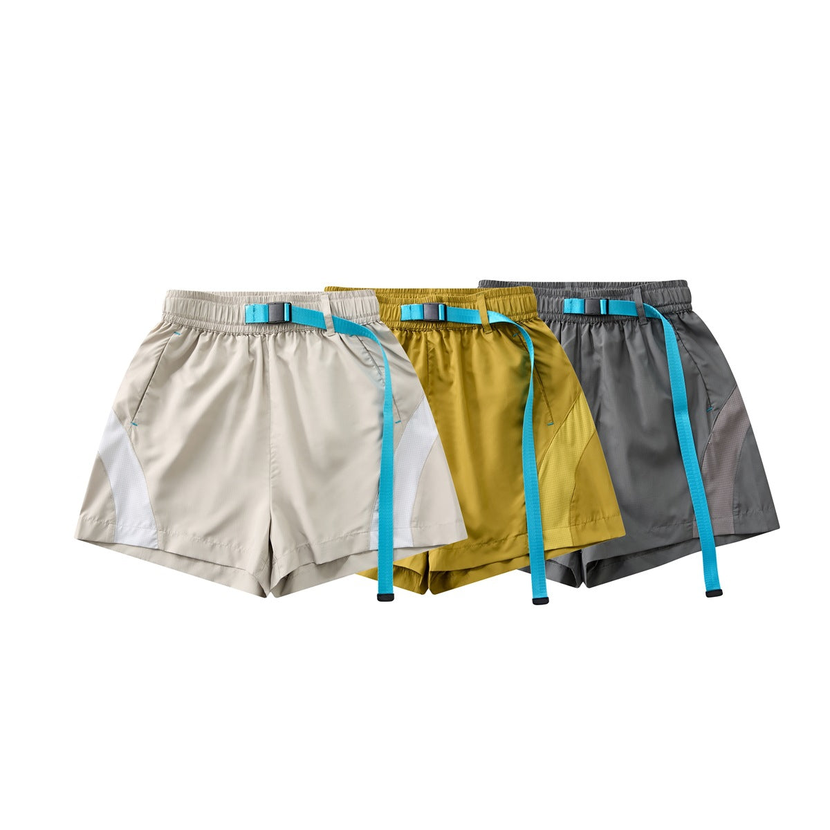 Three pairs of shorts shown from the front in cream, mustard yellow and charcoal gray, each with a turquoise belt.