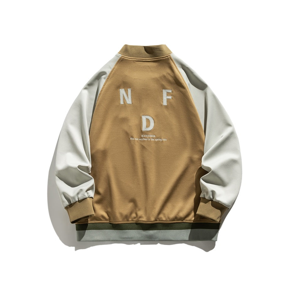 Back of a tan jacket with cream raglan sleeves, ribbed cuffs and hem, and embroidered white lettering.