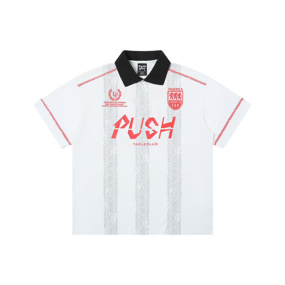 White short-sleeve polo jersey with black collar, red stitching, tire-tread stripes and red PUSH graphic, front flat view