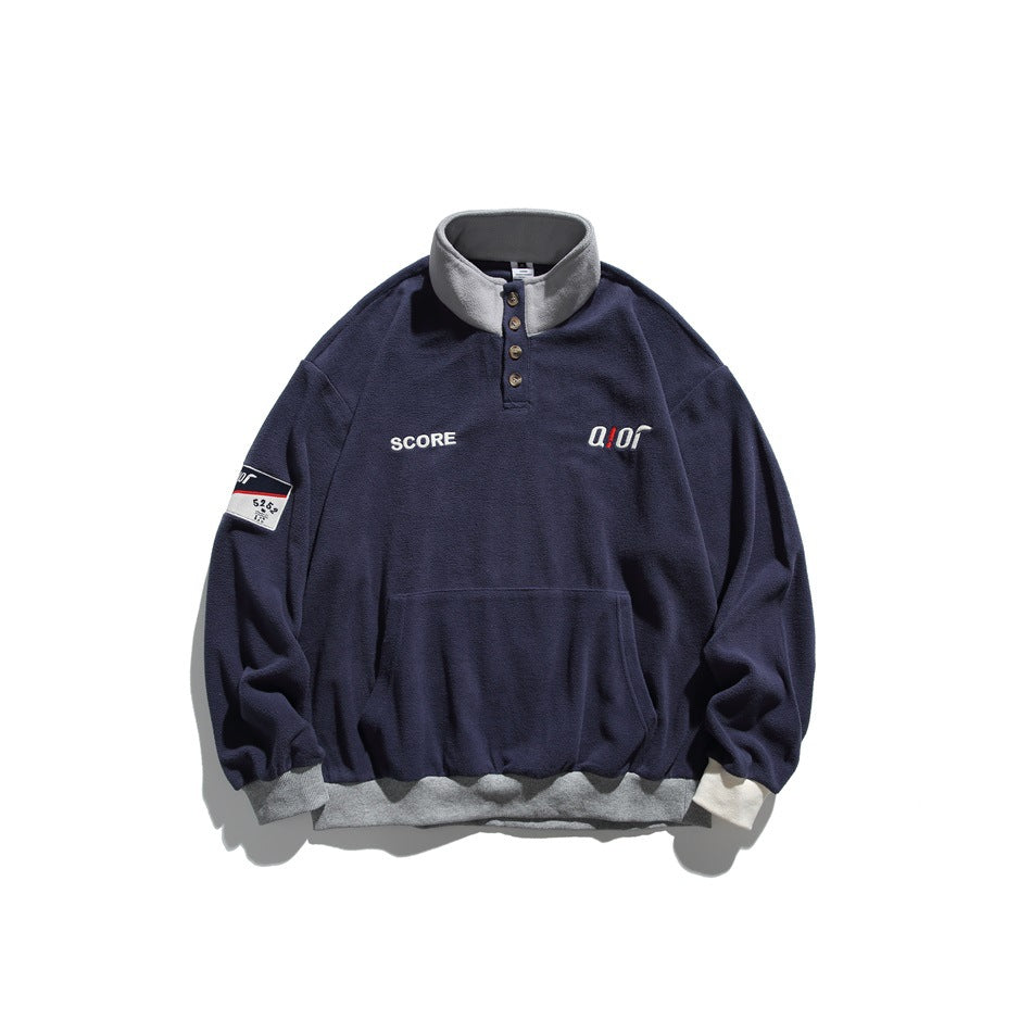 Navy fleece-like pullover with gray stand collar, button placket, kangaroo pocket and gray ribbed hem, flat view