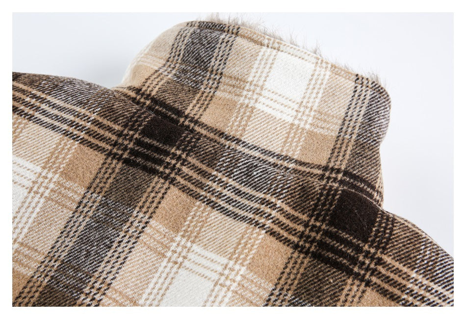 Close-up of the plaid coat's raised collar and upper back.