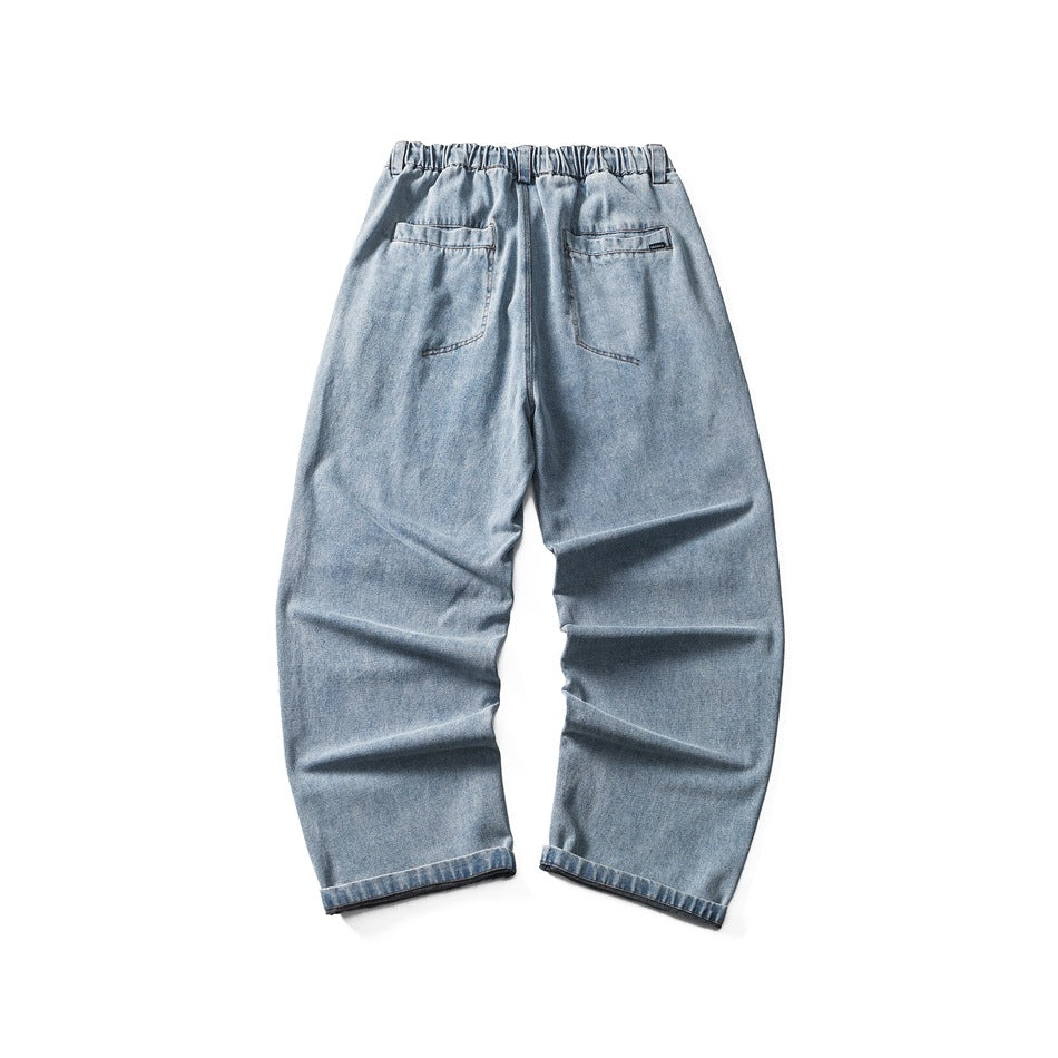 Back view of light blue wide-leg jeans with an elastic waistband and two rear pockets.