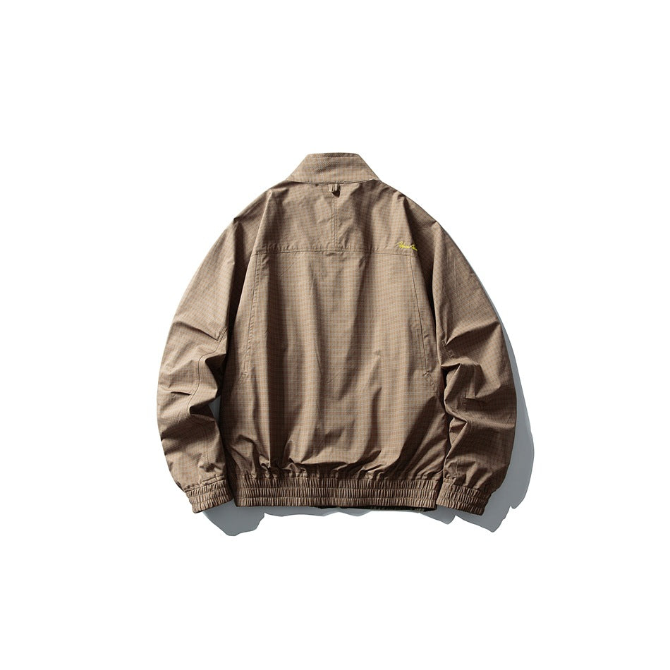 Back view of a brown checked jacket with a stand collar, long sleeves, and elasticated cuffs and hem.