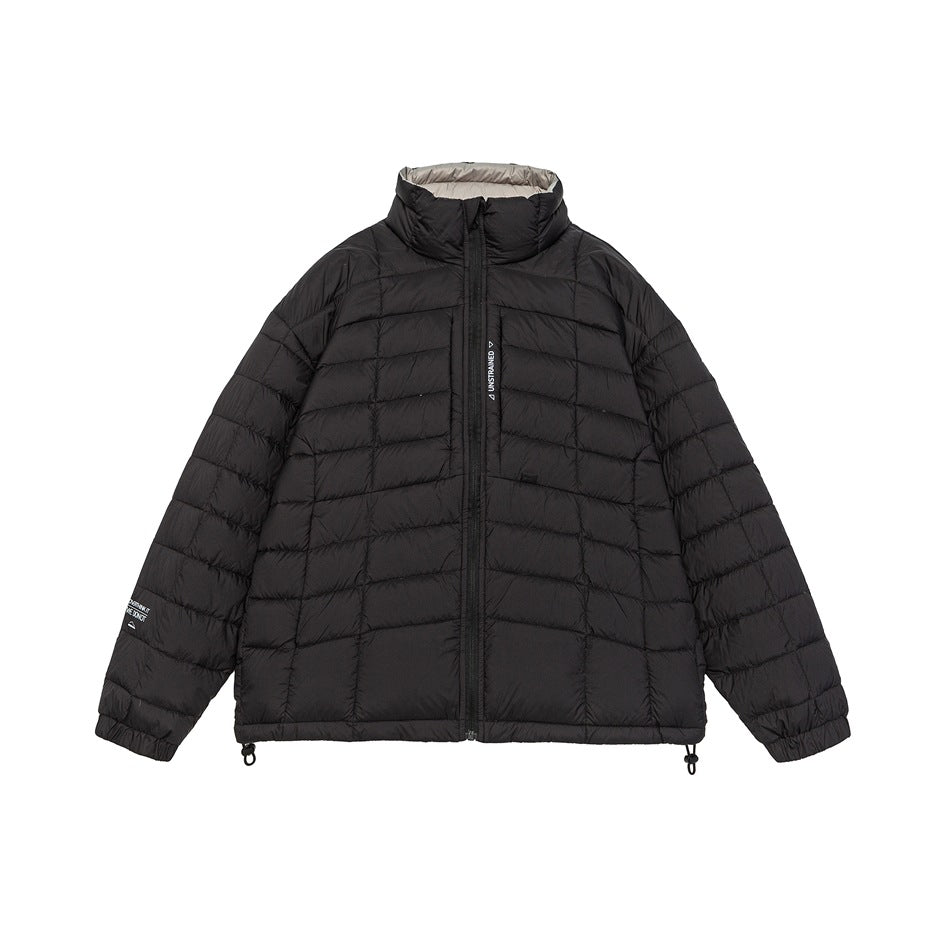 Black quilted puffer jacket with stand collar, front zipper, chest zip pocket and hem drawcords, flat lay