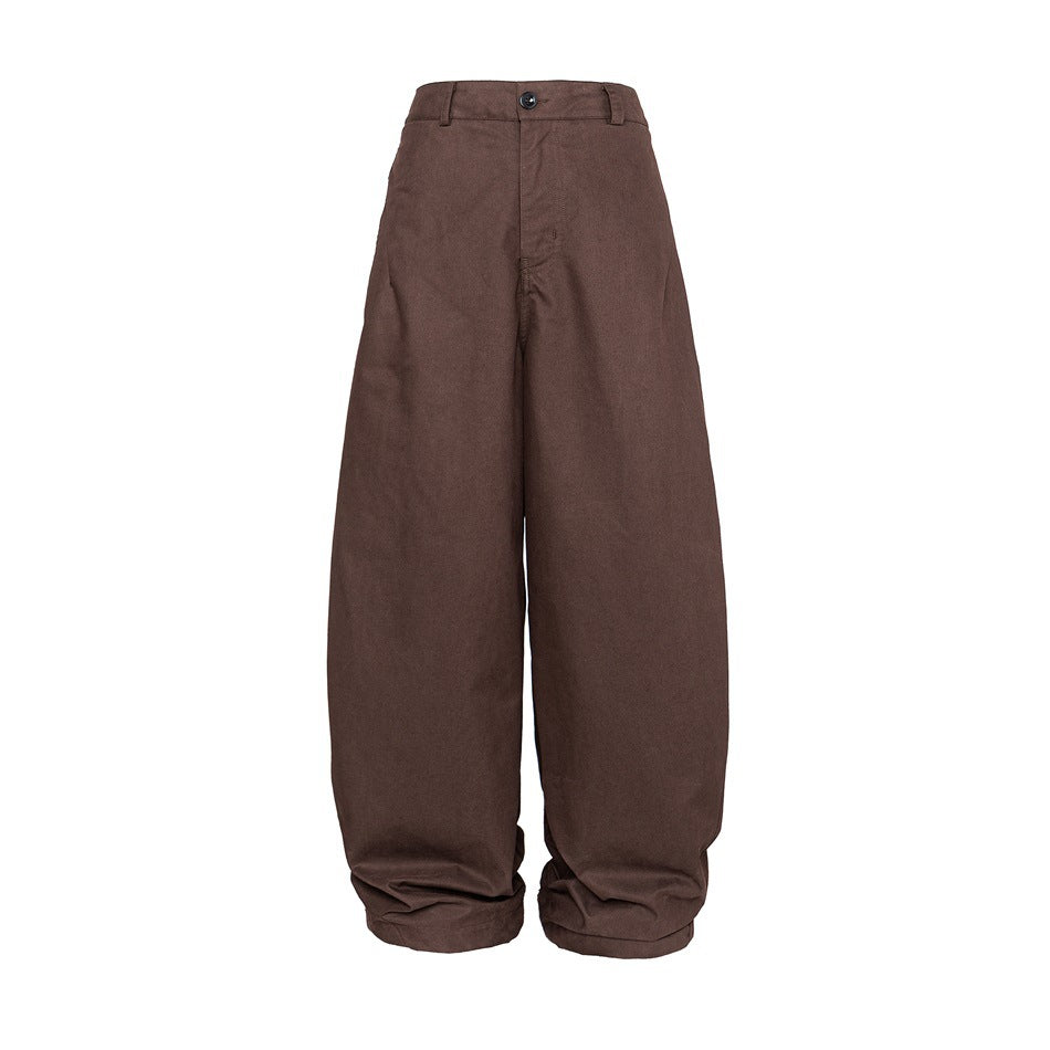 Full front view of brown wide-leg trousers with a button waist and gathered hems.