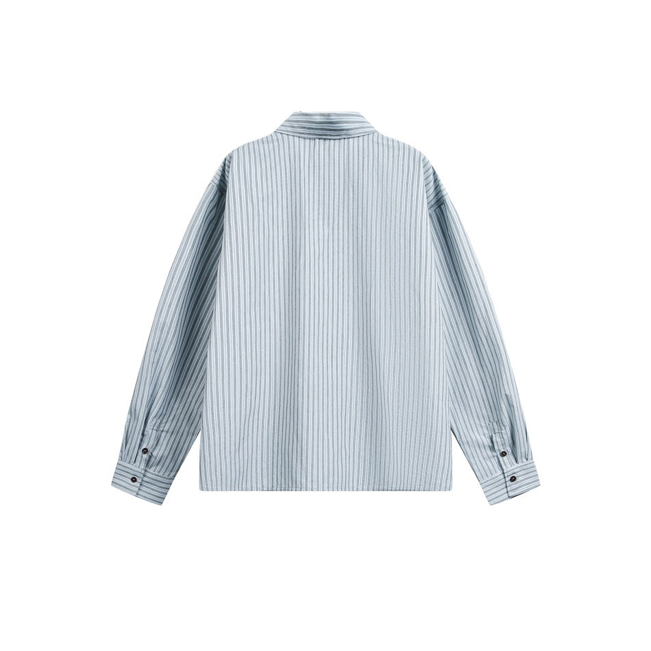 Back view of a long-sleeve collared shirt with narrow blue-gray vertical stripes and buttoned cuffs.