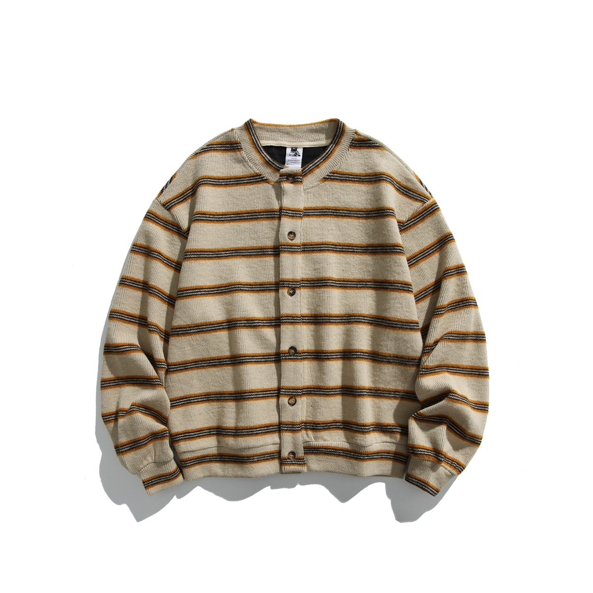 Apricot striped button-front knit cardigan with crew neck, flat lay front view