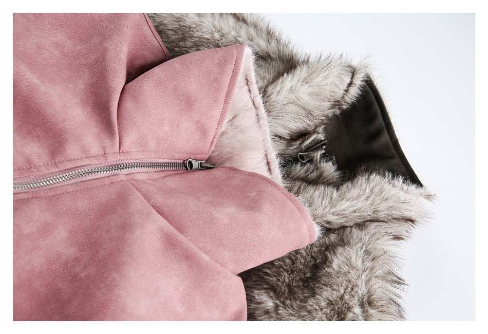 Close-up of a dusty-rose jacket zipper and lapel beside gray-brown fur lining.
