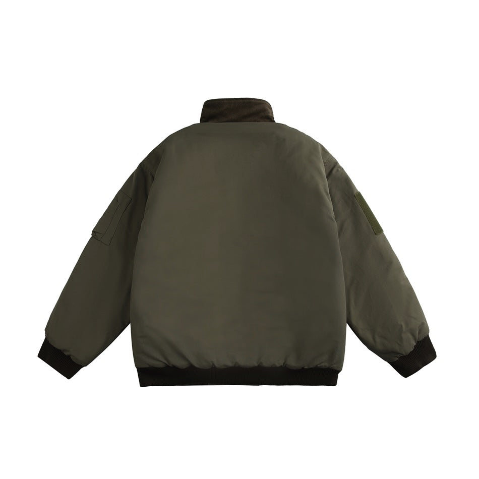 Back view of olive green jacket with brown ribbed collar, cuffs and hem, sleeve zip pocket and sleeve patch
