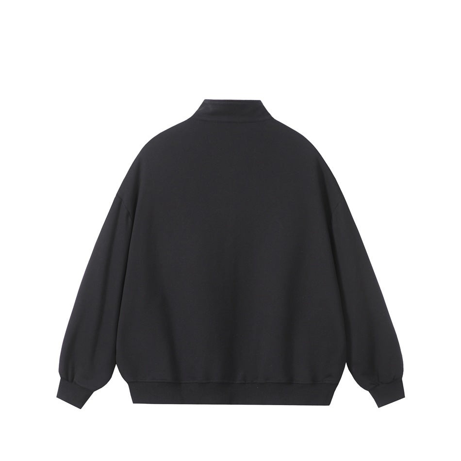 Back view of a plain black zip-up jacket with a stand collar, long sleeves, ribbed cuffs, and a ribbed hem.