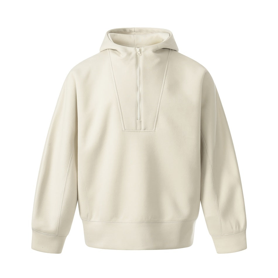 Apricot cream half-zip pullover hoodie, flat front view with V-shaped chest panel and ribbed hem