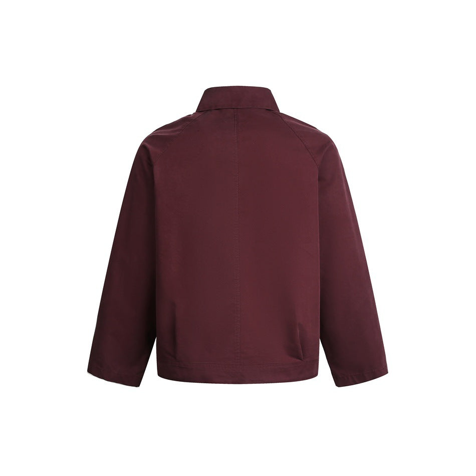 Back view of a burgundy jacket with a short collar, raglan sleeves and a straight hem on a white background.