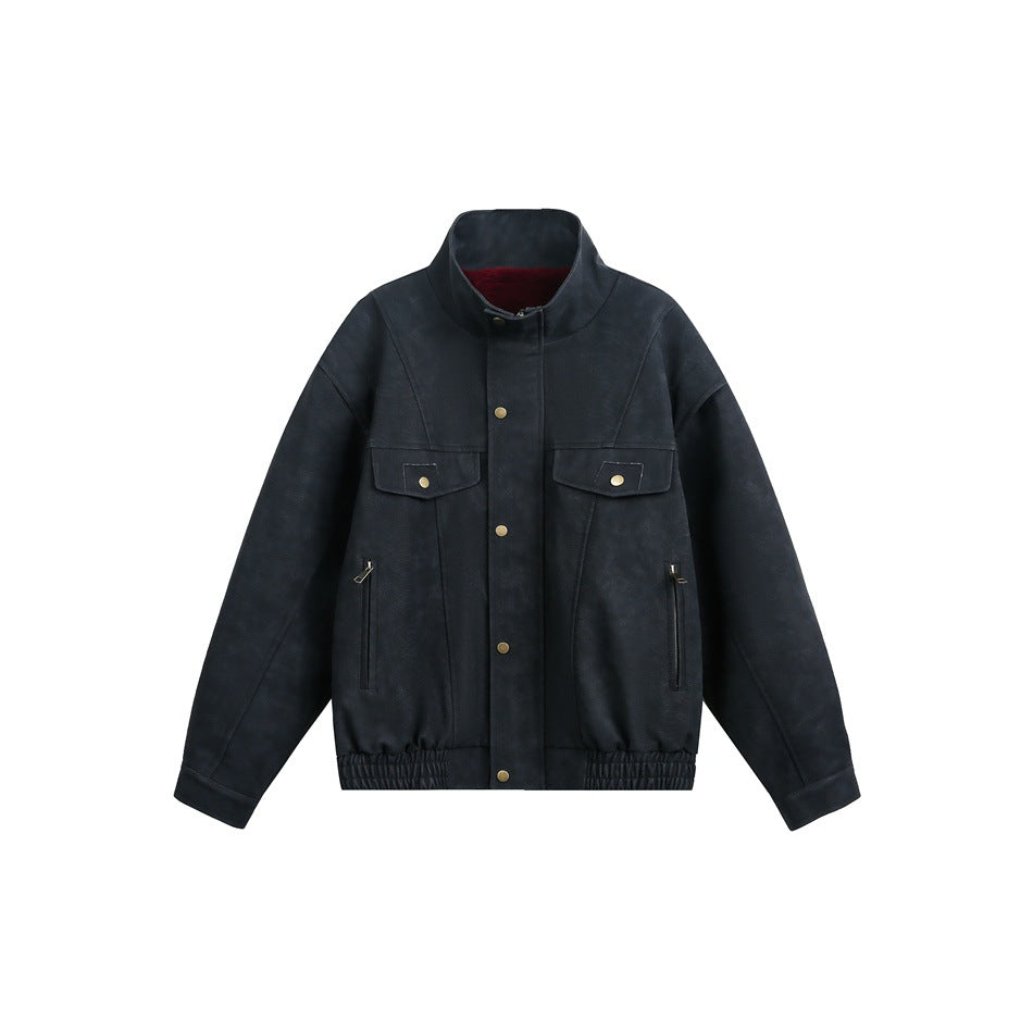 Dark charcoal stand-collar jacket with chest flap pockets, snap front, zip side pockets and elastic hem, flat lay