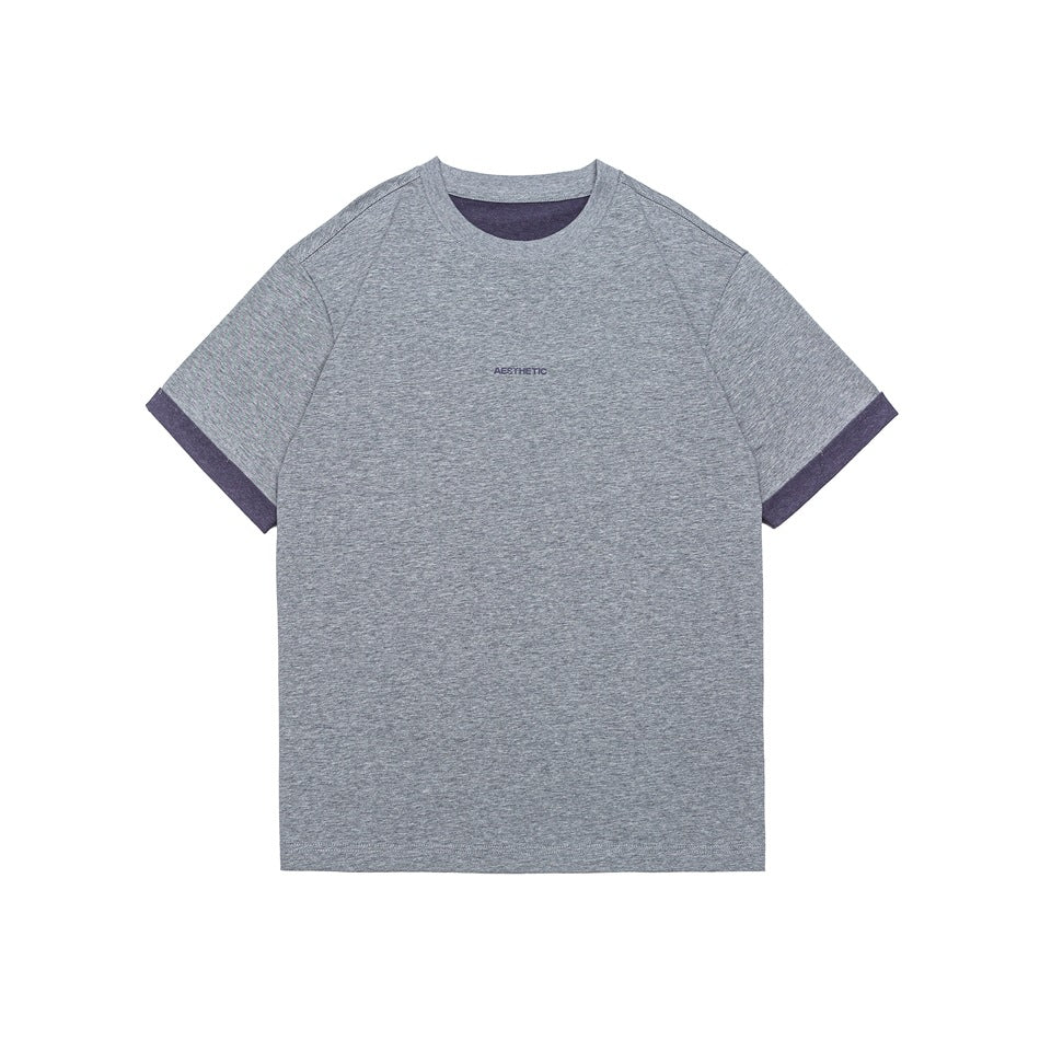 Heather gray short-sleeve crew neck T-shirt with purple-gray contrast cuffs and inner neckline, small chest lettering