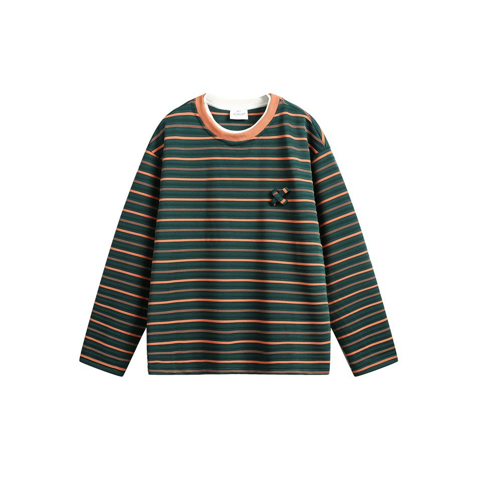 Front view of a dark green long-sleeve crewneck top with orange horizontal stripes and a small chest bow.