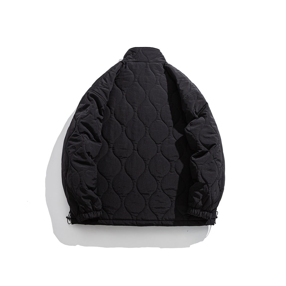 Back view of a black quilted jacket with a high collar and elastic cuffs.