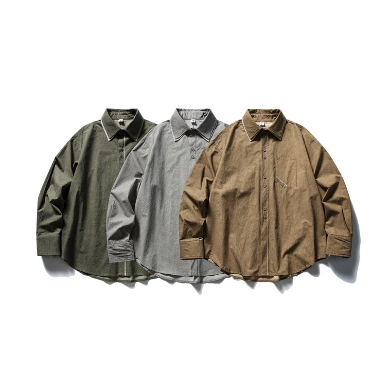 Three long-sleeve button-up shirts displayed together in dark green, gray, and brown.