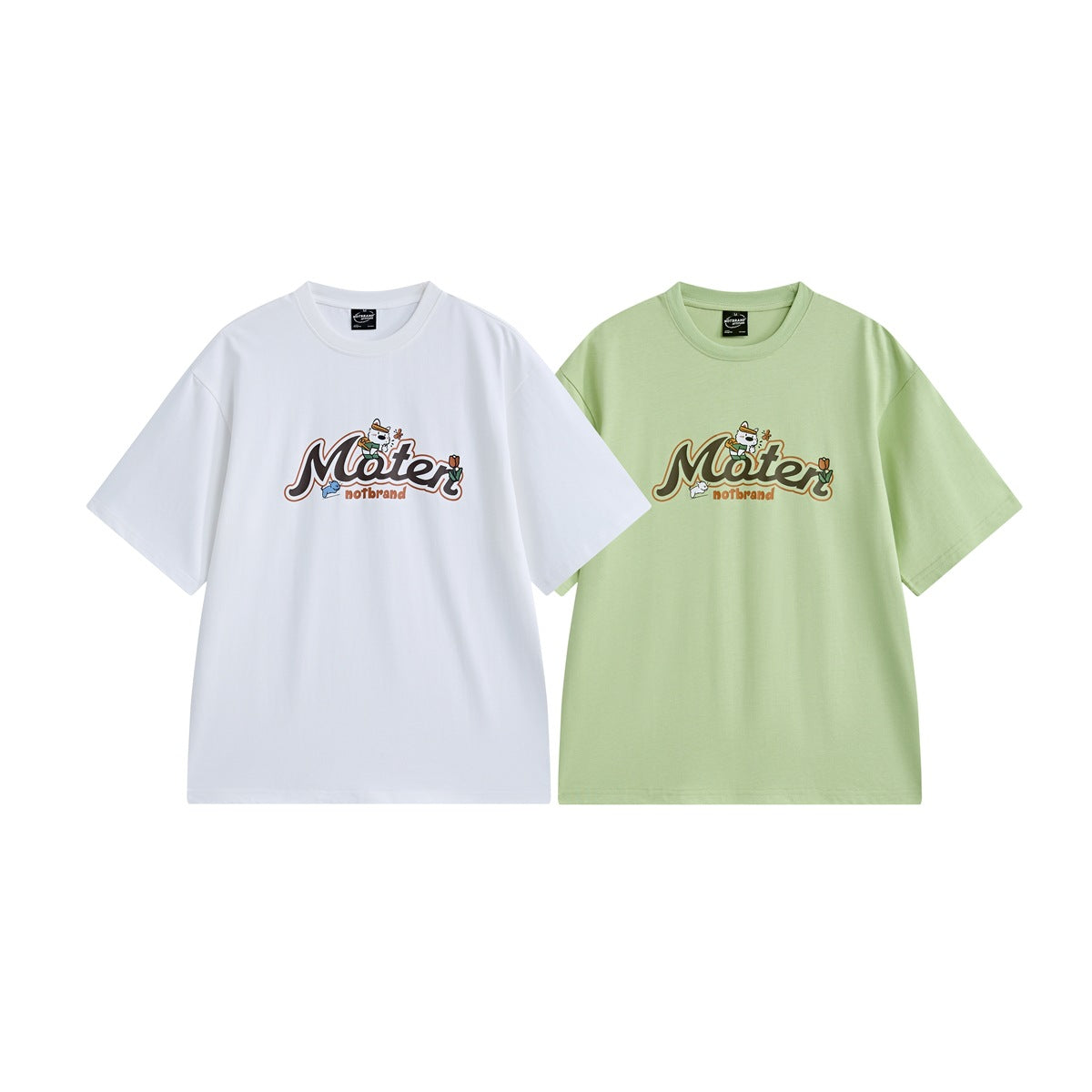 White and pale green oversized crew-neck T-shirts displayed front-facing with matching cartoon lettering graphics.