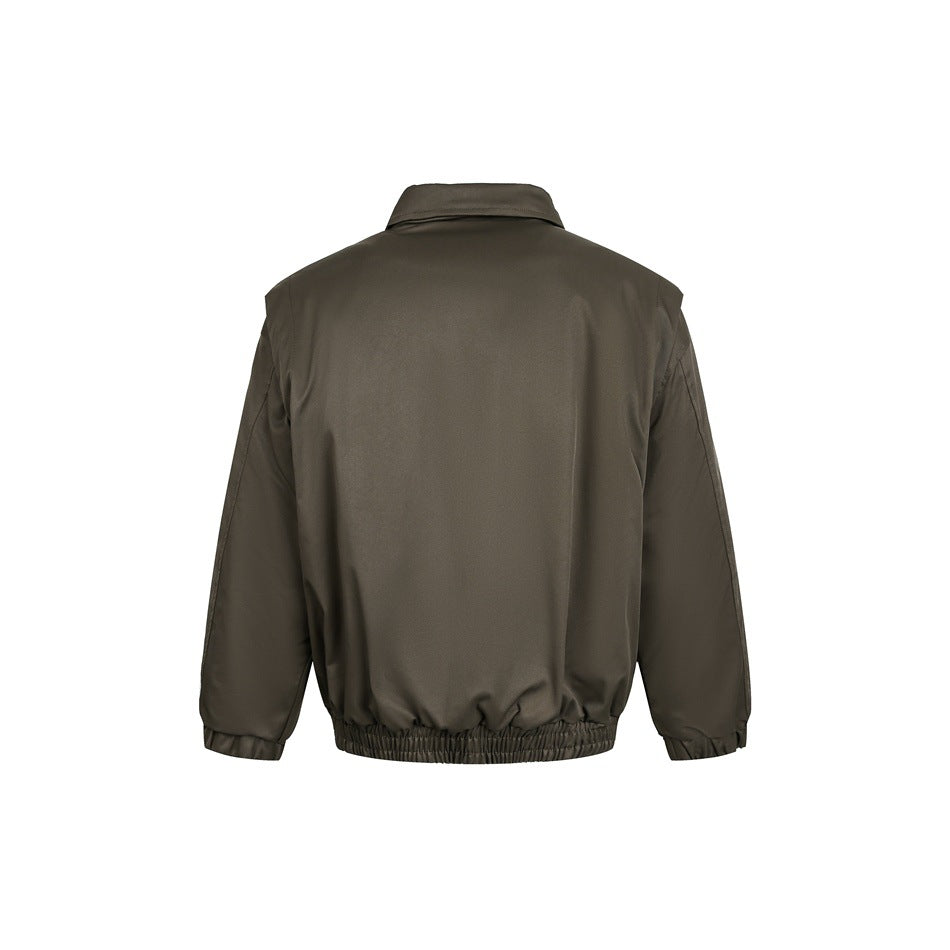 Back view of a dark olive jacket with a fold-down collar, long sleeves and a gathered elastic hem.