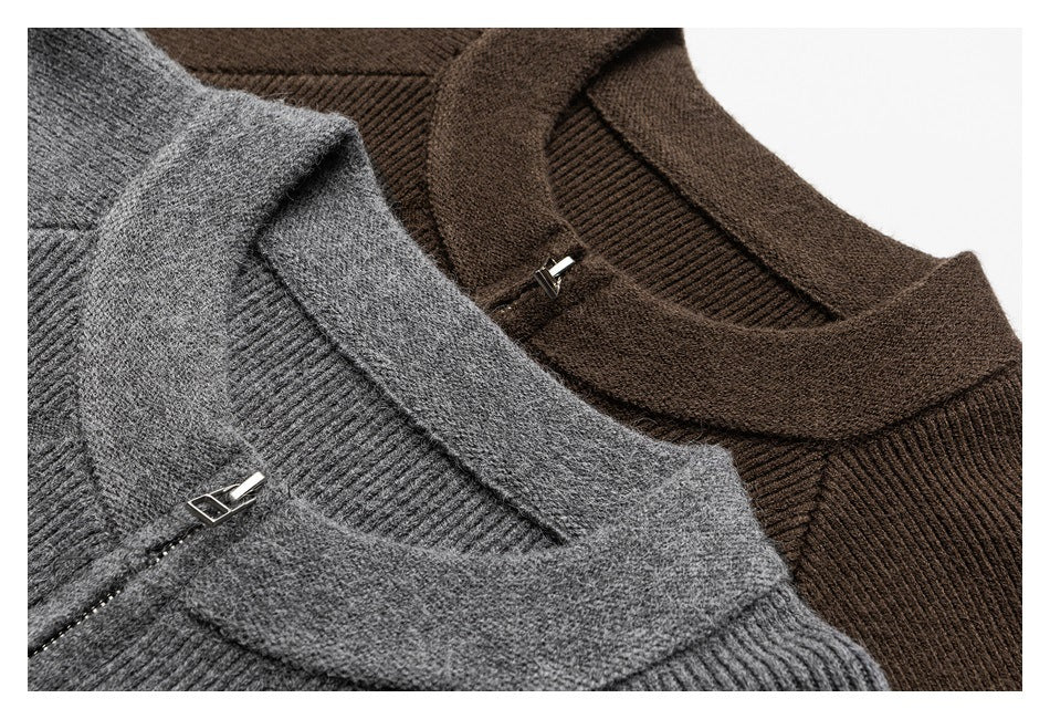 Close-up of gray and brown rib-knit cardigan collars with small metal zipper pulls.