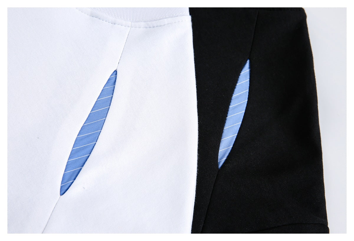 Close-up of blue striped inserts on white and black tops.