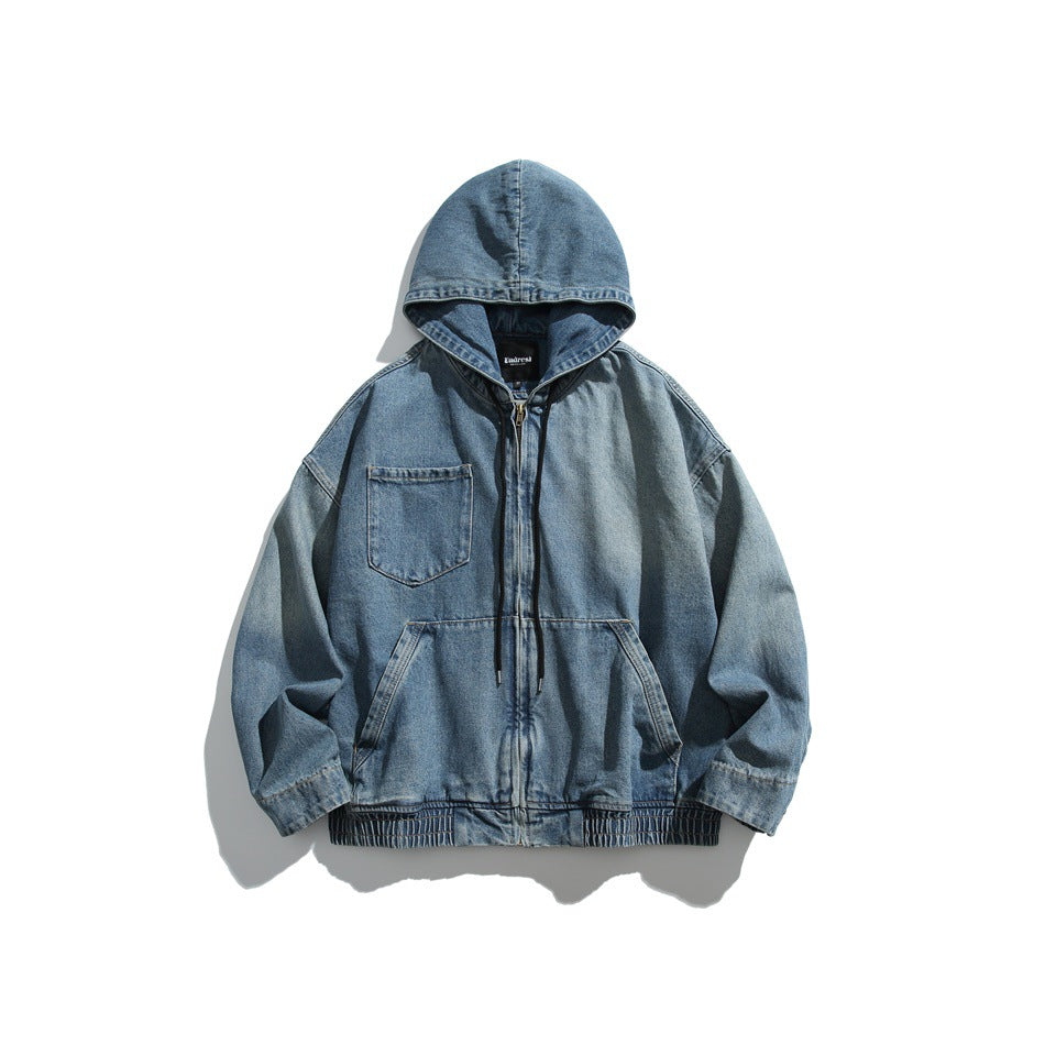 Blue washed denim hooded jacket with front zip, drawstrings, chest pocket and ribbed hem, flat front view