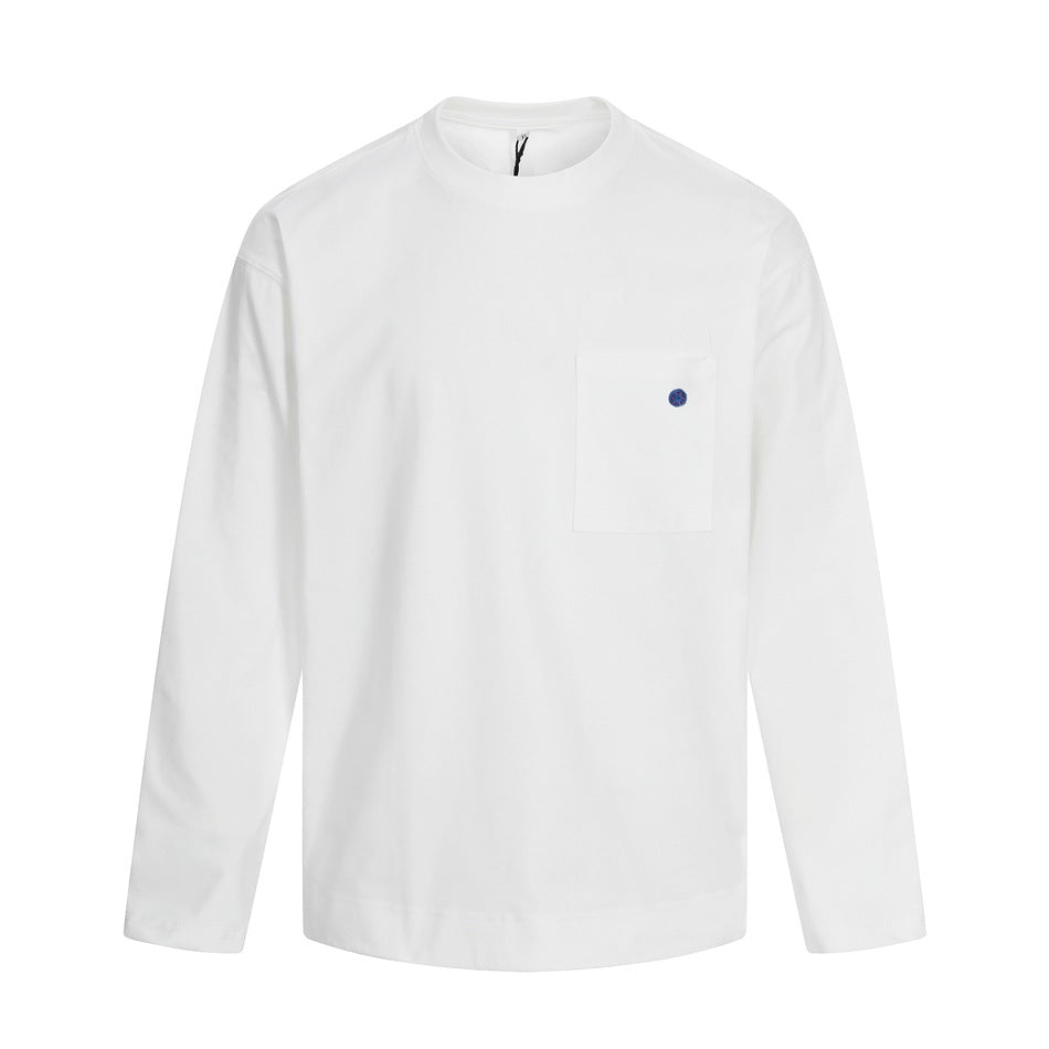 White long-sleeve crew neck top with chest patch pocket and small blue button, flat front view