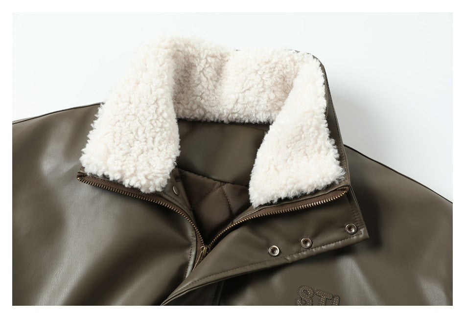 Close-up of the jacket's wide cream sherpa collar, open zipper, and olive-brown outer shell.