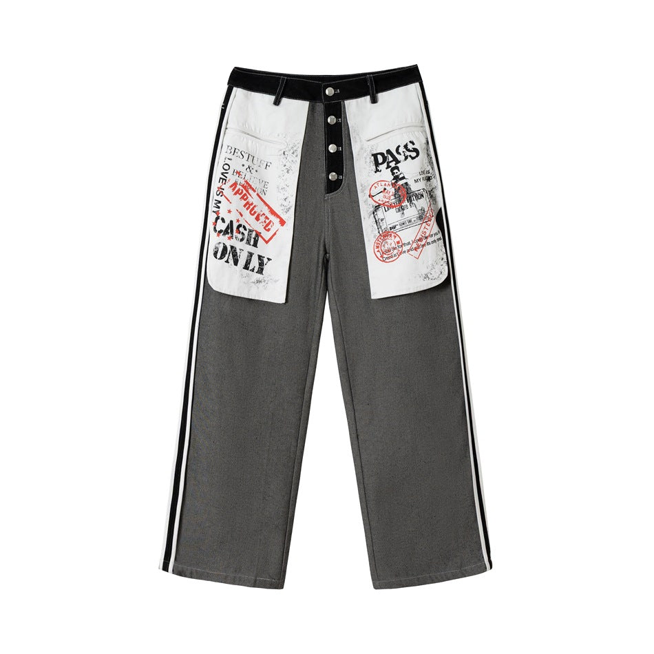 Front flat view of wide-leg gray jeans with white printed pocket panels, button fly, black waistband and side stripes