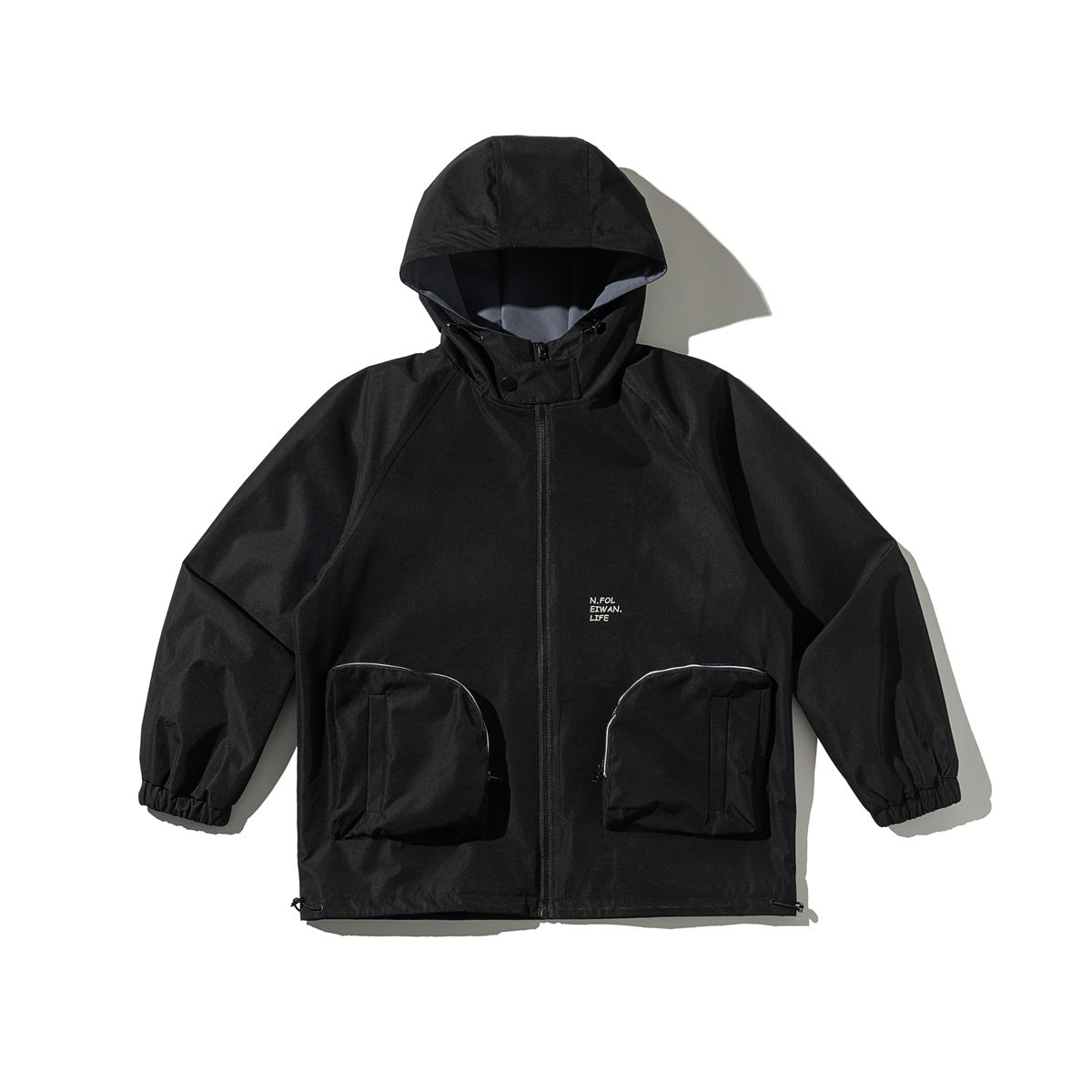 Black hooded zip-up jacket flat lay with two large zippered front pockets, elastic cuffs and drawcord hem