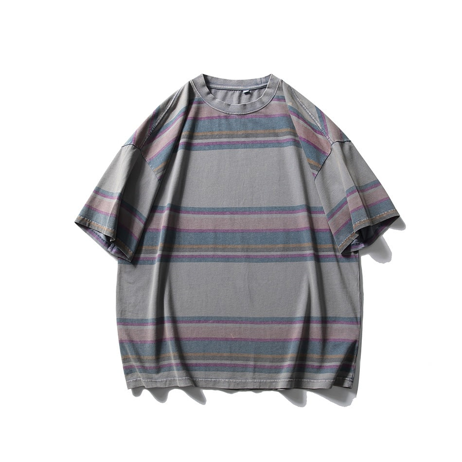 Gray crew-neck short-sleeve T-shirt with blue, pink, purple and tan horizontal stripes, flat lay front view