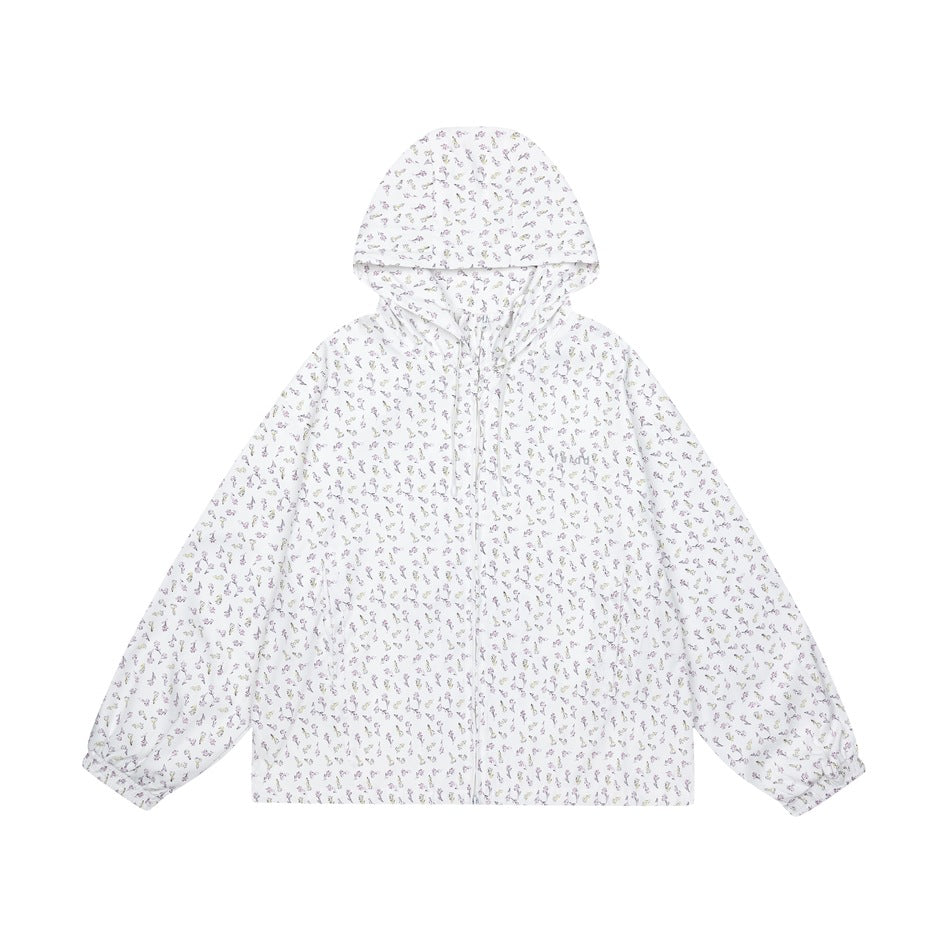 White hooded zip jacket with all-over small pastel floral print, drawstring hood and elastic cuffs, flat front view