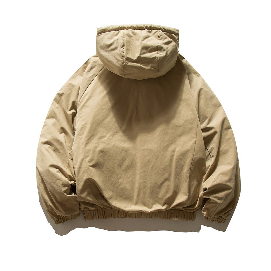 Back view of a tan hooded jacket with long sleeves and a gathered elastic hem.
