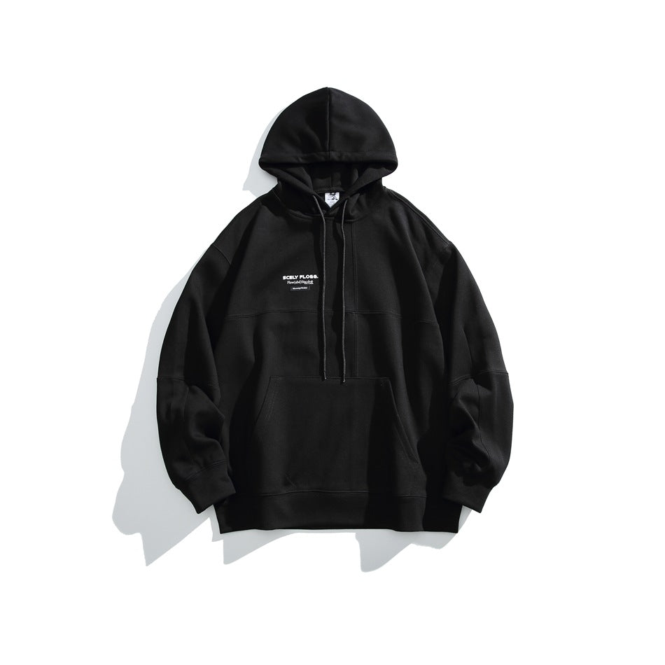 Black pullover hoodie flat lay with drawstring hood, kangaroo pocket, paneled seams and small chest print