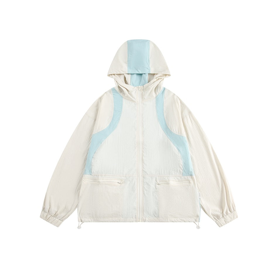 Off-white hooded zip jacket with light blue color-block panels and zippered chest-level pockets, flat lay