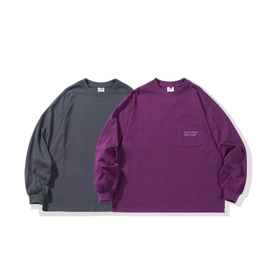 Two long-sleeve shirts displayed side by side: charcoal and plum, both with crew necks; the plum shirt has a chest pocket.