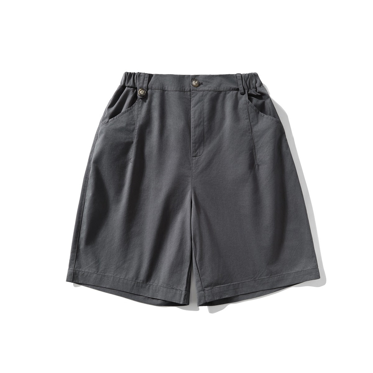 Dark gray knee-length shorts flat lay, front view with elastic waistband, button closure and slanted pockets