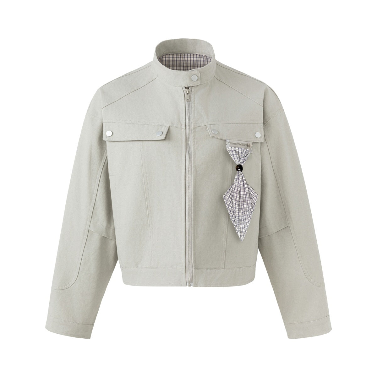 Light grey cropped stand-collar zip jacket with chest flap pockets and a plaid fabric tie charm, flat front view