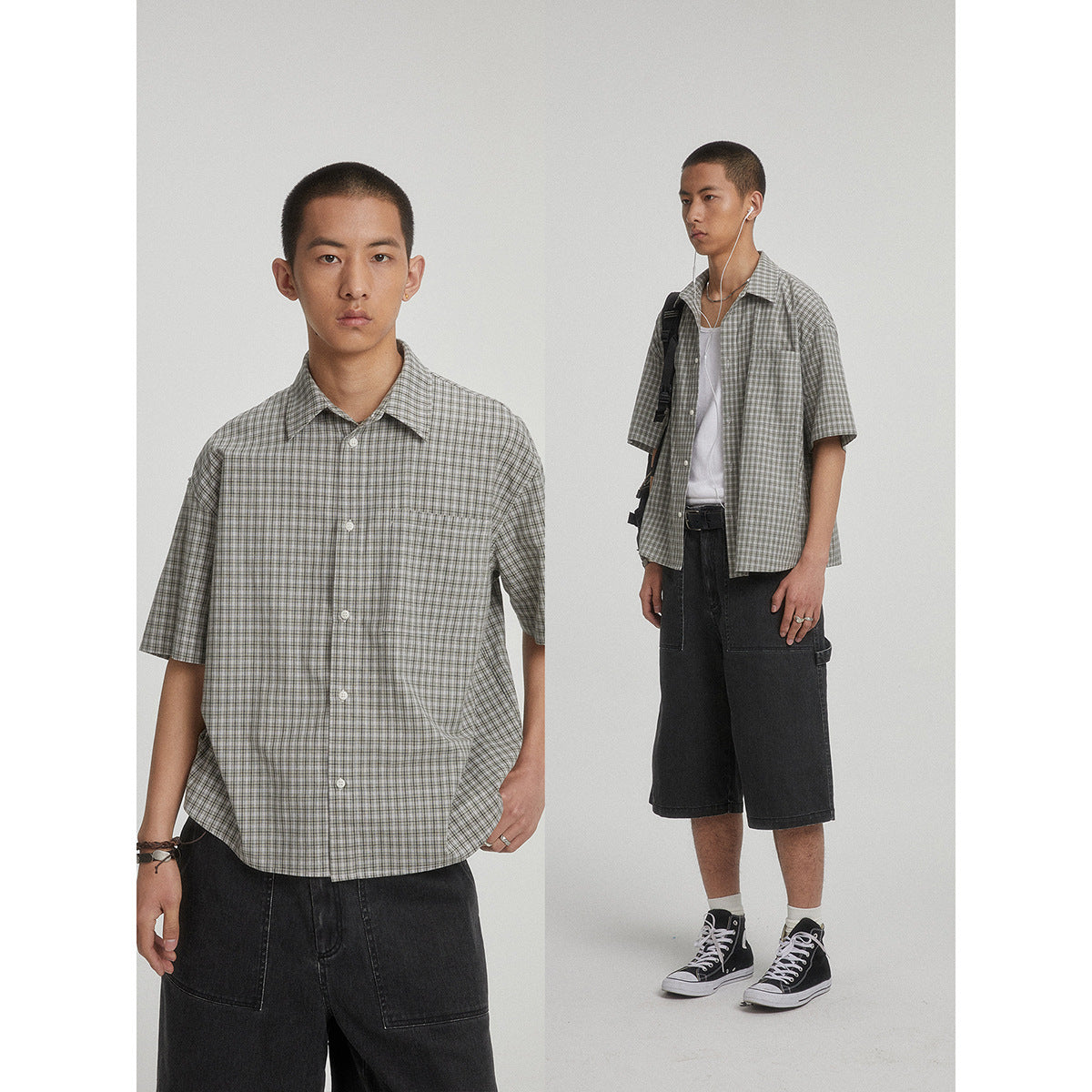 Two views of a model wearing a gray checked short-sleeve button-up shirt with dark shorts.