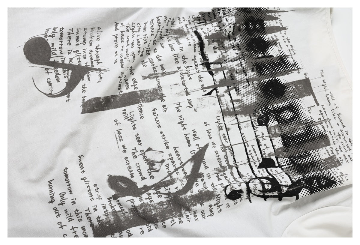 Close-up of a white garment with a black and gray graphic print featuring scattered English text.