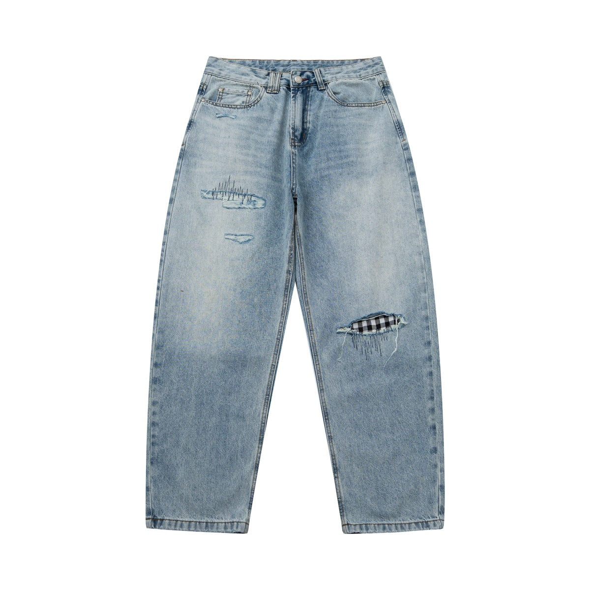 Front view of light blue washed distressed jeans with embroidered rips and a gingham patch at the knee
