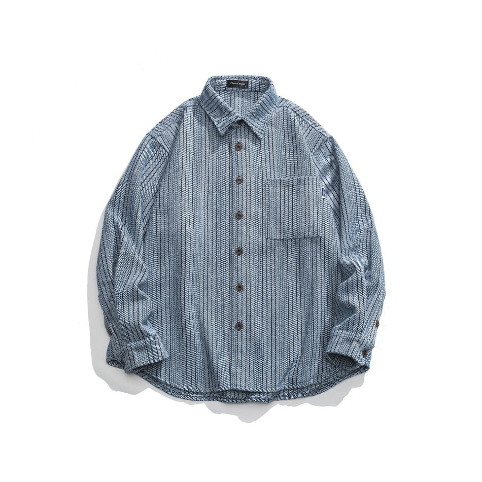 Blue vertical-striped textured long-sleeve button-up shirt with chest pocket, flat lay front view