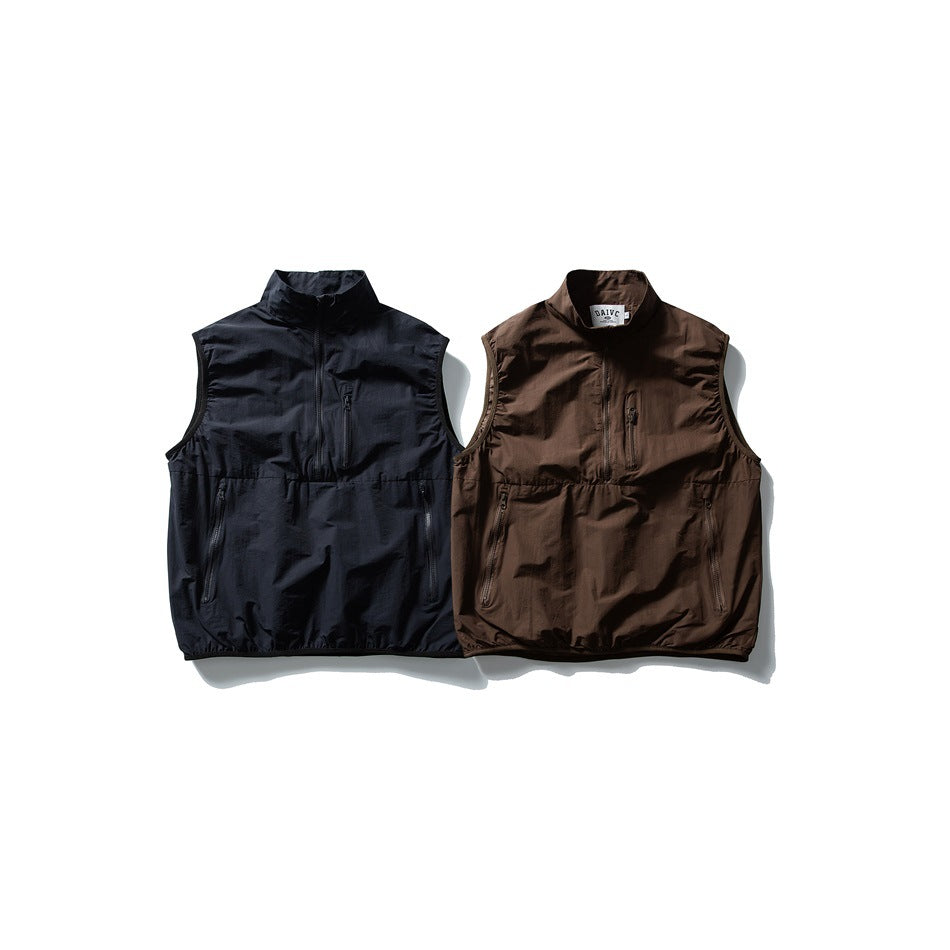 Two sleeveless zip-front vests shown flat against white: one dark navy and one dark brown.