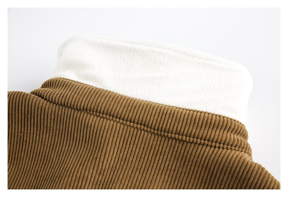 Close-up of the brown jacket collar with thick white fuzzy lining folded over the top.