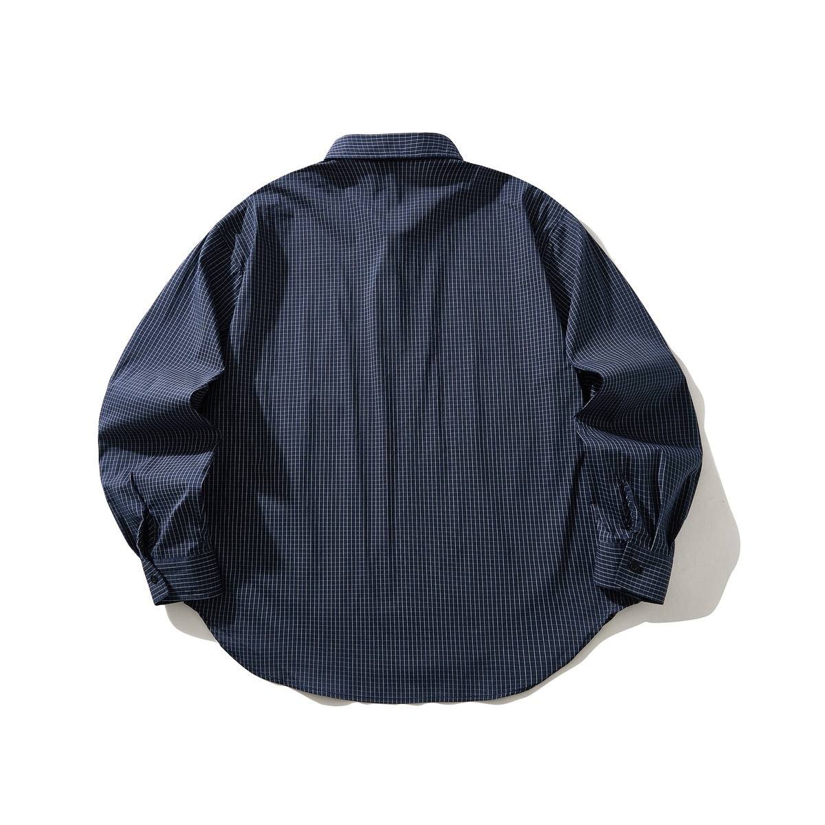 Back view of a navy long-sleeve button-up shirt with a fine light check, laid flat.