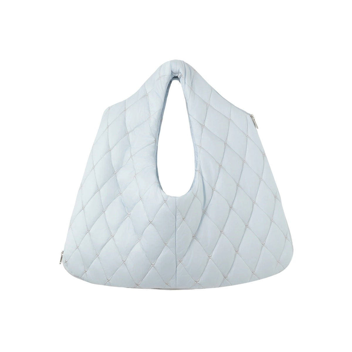Pale blue quilted shoulder bag with a large loop handle, diamond stitching and silver zipper pulls on a white background.