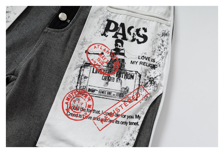 Close-up of a white jeans panel featuring distressed black text and red stamp-style graphics.