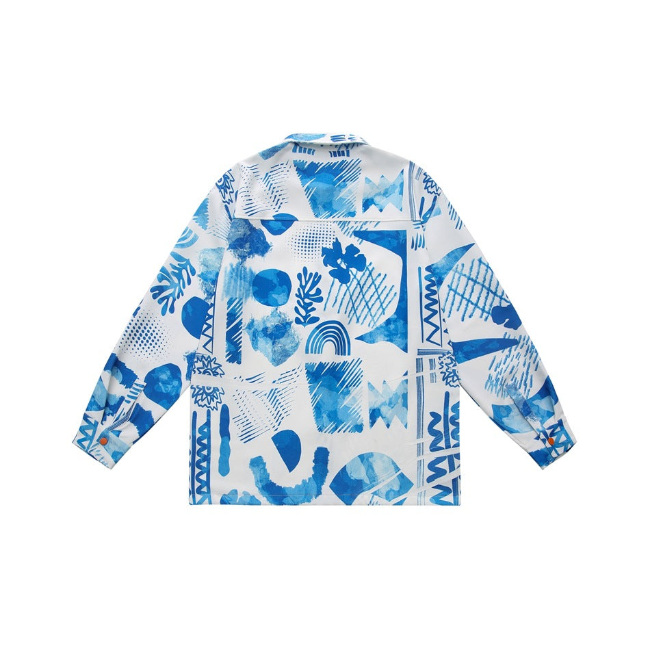 Back view of a white long-sleeved shirt jacket with a bold blue abstract geometric print.