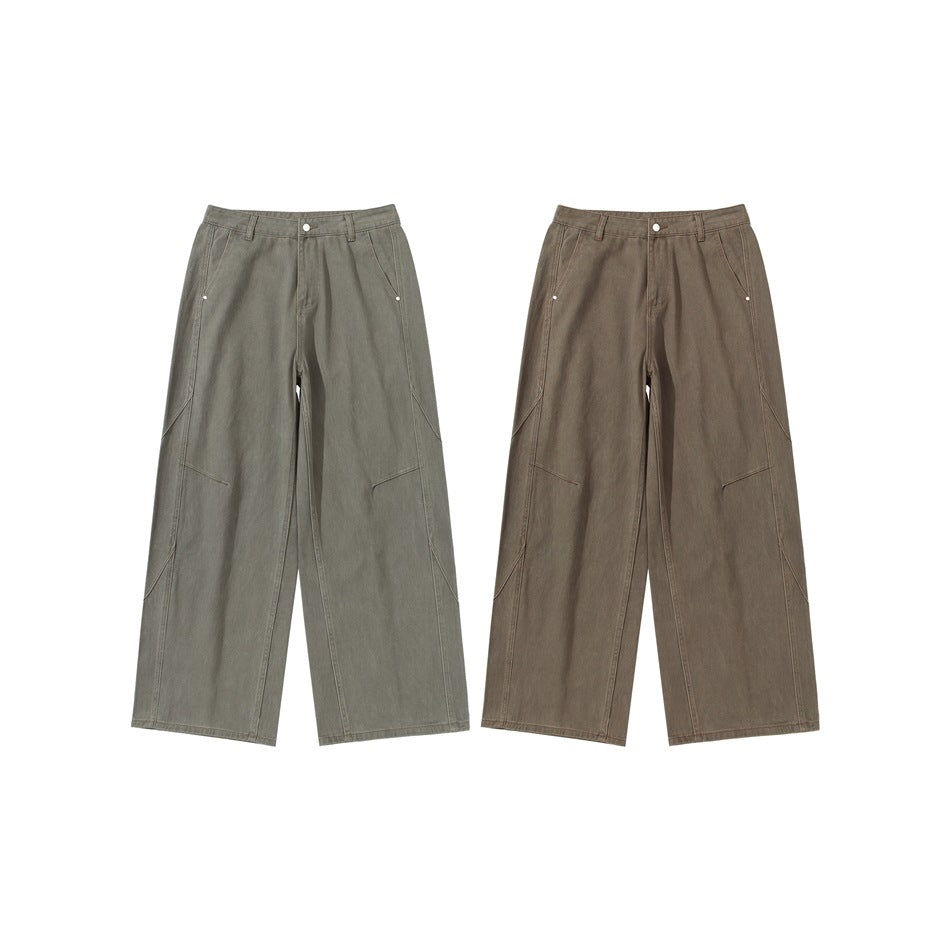 Two pairs of wide-leg pants shown from the front in olive gray and muted brown, with angled pockets and silver-tone buttons.