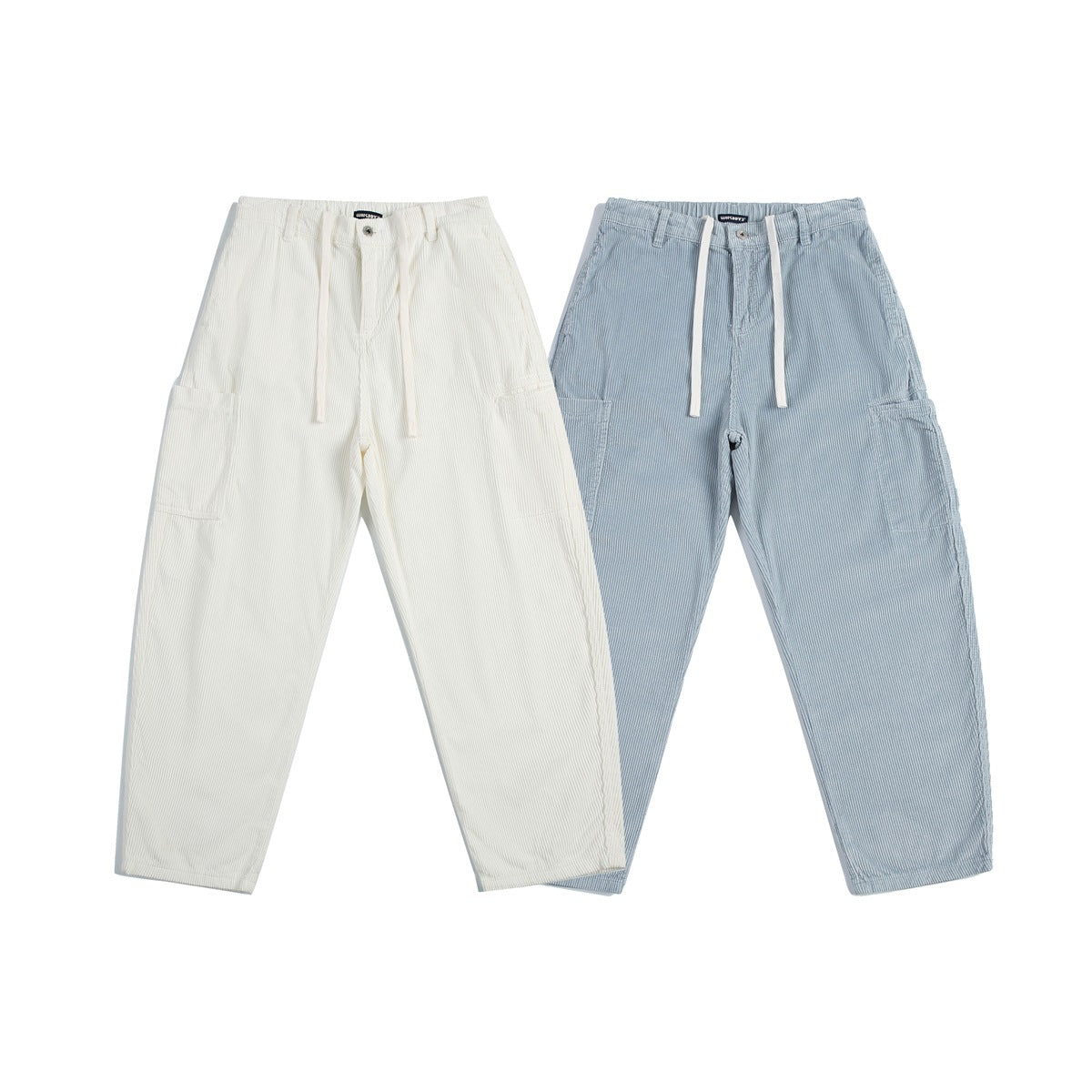 Front view of relaxed, wide-leg ribbed trousers in off-white and light blue, both with drawstrings and side pockets.